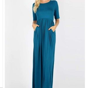 NWT MAXI DRESS TEAL in color